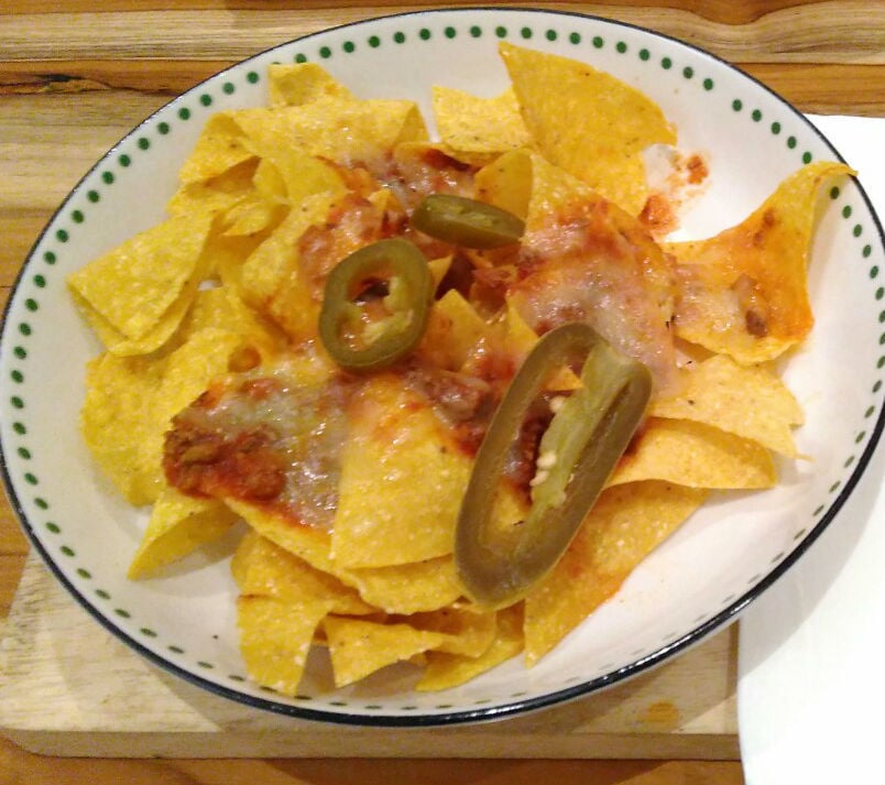 Cheese nachos with Bolognese. (suara.com/Firsta Nodia)