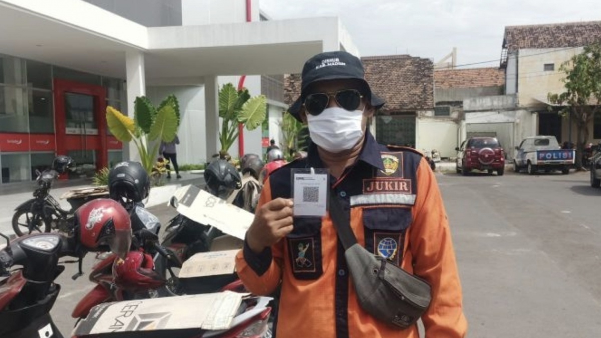 Cegah Kebocoran Pendapatan Daerah,  Pemkab Madiun Manfaatkan QRIS untuk Retribusi Parkir