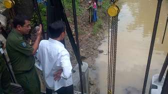 Menagih Janji Jokowi untuk Selesaikan Masalah Banjir di Jakarta