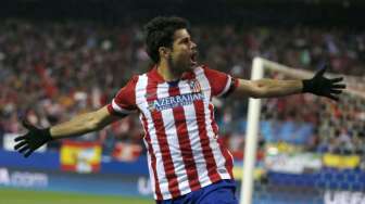 Striker Atletico Madrid Diego Costa rayakan gol ke gawang AC Milan [Reuters/Sergio Perez]