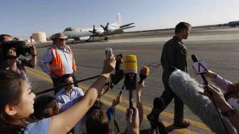 Letnan Russel Adams, pilot Royal Australian Air Force yang bertugas mencari serpihan pesawat Malaysia Airlines MH370. [ Reuters/Jason Reed] 