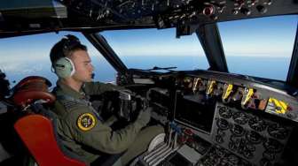 Foto: Pilot Tampan Pencari Pesawat MH370