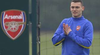 Wenger Tantang Vermaelen Tampil Baik Lawan City