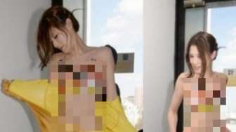 Iklankan Sponsor, Petinju Cantik Tampil "Topless"