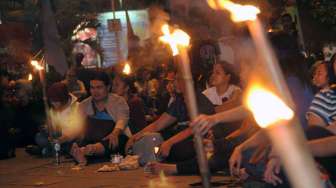 Peluncuran Obor Marsinah di Taman Ismail Marzuki Cikini Jakarta, Rabu (30/4). [suara.com/Adrian Mahakam]