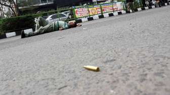 Simulasi Sispamkota menjelang pemilu presiden 2014 di Jalan Margonda Raya Depok, Selasa (27/5). [suara.com/Adrian Mahakam]