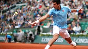 Djokovic dan Sharapova Melaju, Federer Tersingkir