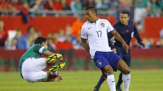 Pertandingan uji coba antara Meksiko dan Portugal di ajang Piala Dunia, di Foxborough, Massachusetts, Sabtu (7/6). [Reuters/Brian Snyder] 