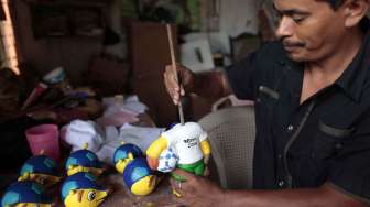 Maskot resmi Piala Dunia FIFA 2014, berbahan tanah liat, di La Paz Centro, Kamis (3/7). [Reuters/Oswaldo Rivas]