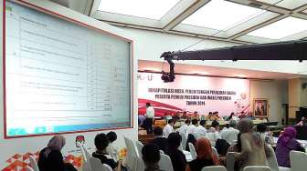 Komisi Pemilihan Umum (KPU) menggelar Rapat Pleno Terbuka Rekapitulasi Penghitungan Suara Pemilu Presiden & Wakil Presiden Tahun 2014 bagi WNI di Luar Negeri, di Jakarta, Kamis (17/7). [suara.com/Bowo Raharjo]