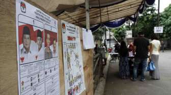 Pencoblosan ulang pemilu presiden 2014 di TPS 009 Kelurahan Bangka, Jakarta, Sabtu (19/7). [suara.com/Adrian Mahakam]