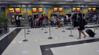 Suasana Terminal 3 Bandara Soekarno-Hatta Jakarta menjelang hari raya Idul Fitri 1432H, Rabu (23/7). [suara.com/Adrian Mahakam]