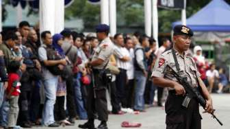 Penukaran uang pecahan kecil di mobil penukaran uang di lapangan IRTI Monas, Jakarta (25/7). [suara.com/Adrian Mahakam]