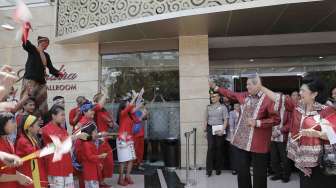 Presiden SBY didampingi Ibu Ani menghadiri Puncak Peringatan Hari Anak Nasional (HAN) 2014 di Gedung Sasana Kriya, Taman Mini Indonesia Indah, Jakarta Timur, Rabu (6/8). [Rumgapres/Abror]