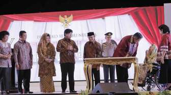 Presiden SBY didampingi Ibu Ani menghadiri Puncak Peringatan Hari Anak Nasional (HAN) 2014 di Gedung Sasana Kriya, Taman Mini Indonesia Indah, Jakarta Timur, Rabu (6/8). [Rumgapres/Abror]