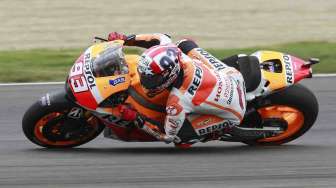 Juara dunia Marc Marquez, untuk kesepuluh kalinya berturut-turut, memenangkan MotoGP yang digelar di Indianapolisi, Amerika Serikat, Minggu (10/8). [Reuters/Brent Smith]