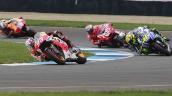 Juara dunia Marc Marquez, untuk kesepuluh kalinya berturut-turut, memenangkan MotoGP yang digelar di Indianapolisi, Amerika Serikat, Minggu (10/8). [Reuters/Brent Smith]