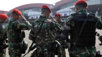 Apel gabungan TNI di JIExpo Kemayoran Jakarta, Kamis (21/8). [suara.com/Adrian Mahakam]