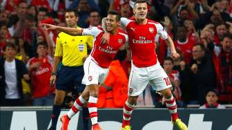 Gol Tunggal Alexis Bawa Arsenal Melaju di Liga Champions