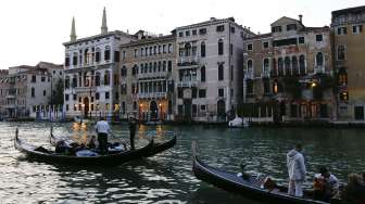 Entrance \"Hotel Aman\" tempat resepsi pernikahan George Clooney-Amal Alamuddin dilangsungkan, Sabtu (27/9/2014). (Reuters/Stefano Rellandini) 