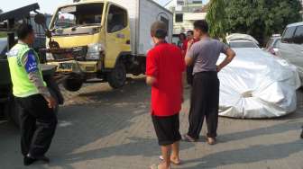 Mobil Lamborghini milik Hotman Paris di Satlantas Polres Jakarta Utara. [suara.com/Ismail]