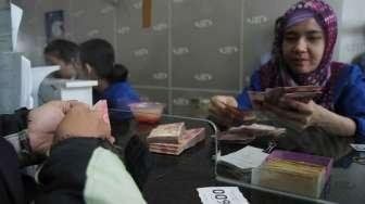 Rupiah Terus Melemah, Tembus Level Rp12.800 per Dolar