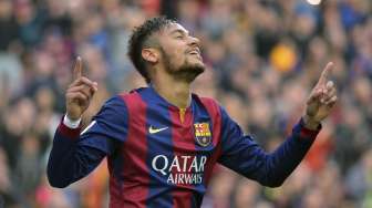 Pemain Barcelona Neymar rayakan golnya ke gawang Levante (16/2) [Reuters/Gustau Nacarino]