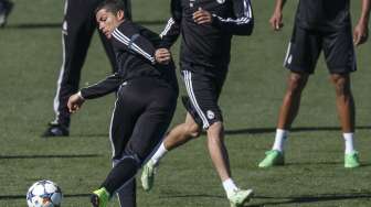 Cristiano Ronaldo beraksi dalam latihan di Valdebebas Sports  Ground (10/3) [Reuters/Sergio Perez]