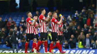 Pemain Southampton rayakan keberhasilan mereka menahan imbang Chelsea di Stamford Bridge (15/3) [Reuters/Eddie Keogh]