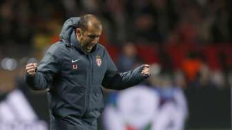 Reaksi pelatih AS Monaco Leonardo Jardim usai timnya berhasil lolos ke babak perempat final (18/3) [Reuters/Jean-Paul Pelissier]
