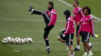 Cristiano Ronaldo (kiri), Luka Modric, Pepe dan Marcelo dalam sesi latihan (22/3) [Reuters/Paul Hanna]