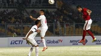 Momen kemenangan timnas Indonesia atas Timor Leste pada Kualifikasi Piala Asia 2016, Jumat (27/3/2015). [Suara.com/Kurniawan Mas'ud]