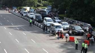 Polisi Lakukan Rekayasa Lalu Lintas saat Acara Kartini Run 2019 di Monas