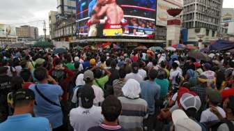 Reaksi publik Filipina saat menyaksikan petinju kebanggaan mereka Manny Pacquiao menelan kekalahan dari Floyd Mayweather, Minggu (3/5) WIB.