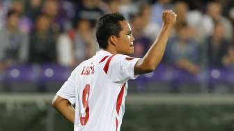 Pemain Sevilla Carlos Bacca rayakan gol ke gawang Fiorentina (15/5) [Reuters/Giampiero Sposito]