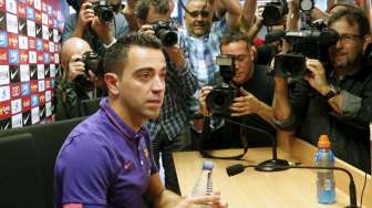 Xavi Umumkan Tinggalkan Barca