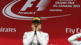 Pebalap Mercedes asal Inggris, Lewis Hamilton menjuarai GP Kanada, (7/6). [Reuters/Chris Wattie]