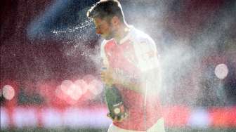 Punggawa Arsenal merayakan kemenangannya dalam duel Community Shield kontra Chelsea di Stadion Wembley, London, Minggu (2/8/2015)