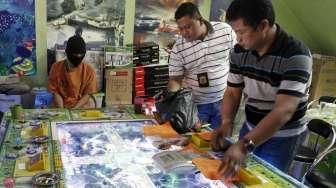 Polisi Bekuk 2 Orang yang Asyik Main Judi Togel