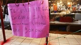 Aksi Protes Pedagang Daging