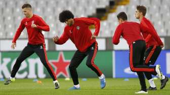 Pemain MU berlatih di Jan Breydel Stadium, Belgia, guna menghadapi leg kedua play-off Liga Champions (26/8) [Reuters/Carl Recine]