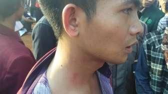 Polisi Pukul Mahasiswa yang Demo di Depan Kantor Jokowi