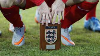 Kapten Inggris Wayne Rooney sebelum pertandingan kualifikasi Piala Eropa kontra San Marino (6/9) [Reuters/Carl Recine]