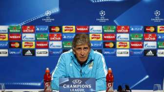 Manajer Manchester City Manuel Pellegrini menghadiri konferensi pers jelang pertandingan (15/9) [Reuters/Carl Recine]