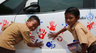 Nissan Tukar Donasi dengan Cap Tangan Anak di Lampung