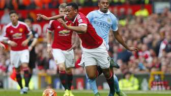 Manchester United menjamu Manchester City di Old Trafford (26/10) [Reuters]