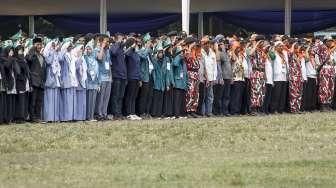 Ribuan elemen masyarakat melakukan Apel Kebhinekaan Lintas Iman Bela Negara di Lapangan Banteng, Jakarta, Minggu (17/1/2016). [Suara.com/Kurniawan Mas'ud]