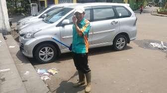 Tukang Sapu Ini akan Selalu Setia Dukung Ahok, Ini Alasannya