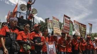 Tuntut Bebaskan Tahanan Buruh