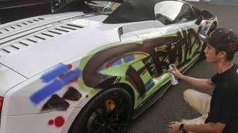 Aksi drifting dan mural Lamborghini dalam kegiatan bertajuk 